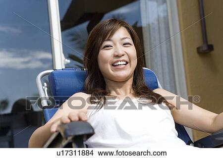 Picture - Young woman smiling at Camera, Saipan. Fotosearch