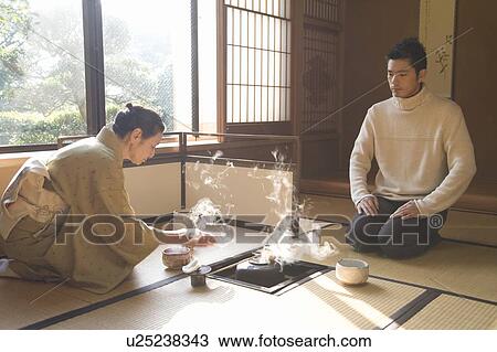 Man attending Japanese tea ceremony, front view, side view, Japan View Large Photo Image Stock Image - Man attending Japanese tea ceremony, front view, side view, Japan. Fotosearch