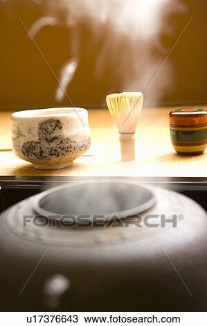Steam coming out of a tea kettle, Japanese tea set on Tatami mats, close up, Japan View Large Photo Image Stock Image - Steam coming out of a tea kettle, Japanese tea set on Tatami mats, close up, Japan. Fotosearch