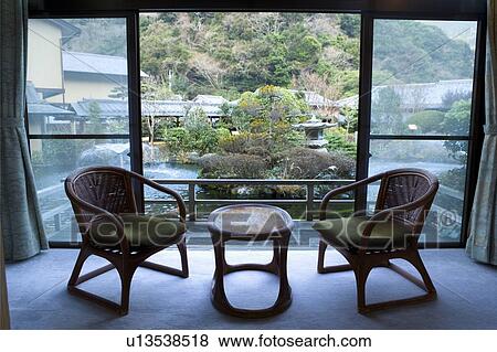 Stock Photo - The view of Japanese garden from a room of a Japanese inn, Japan. Fotosearch