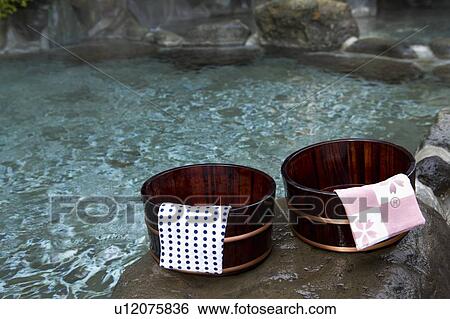 Towels on wooden tubs, hot spring, high angle view, Japan View Large Photo Image Stock Photograph - Towels on wooden tubs, hot spring, high angle view, Japan. Fotosearch