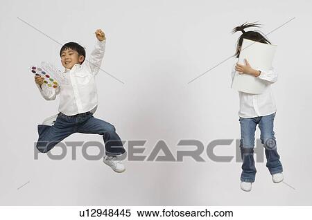 Stock Photography - Boy and Girl painting. Fotosearch
