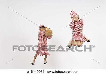 Stock Image - Boy and Girl sleeping. Fotosearch