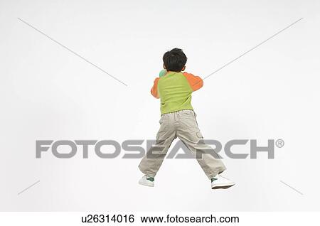 Boy cheering with megaphone View Large Photo Image Stock Photograph - Boy cheering with megaphone. Fotosearch
