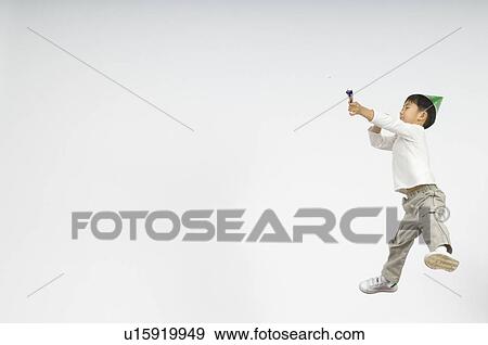 Stock Photo - Boy holding firecracker. Fotosearch
