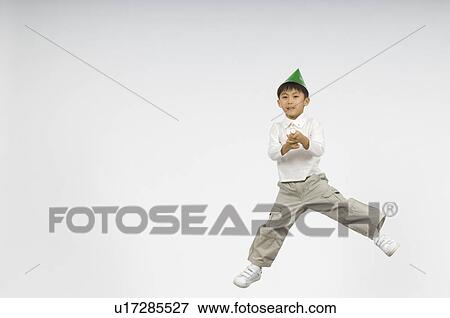 Stock Photo - Boy holding firecracker. Fotosearch
