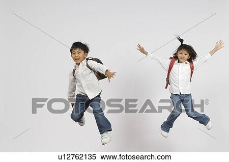 Elementary students jumping View Large Photo Image Stock Photography - Elementary students jumping. Fotosearch
