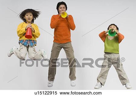 Family shouting with megaphone View Large Photo Image Stock Photography - Family shouting with megaphone. Fotosearch