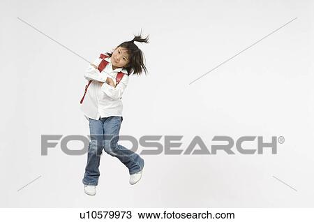 Schoolgirl jumping View Large Photo Image Stock Image - Schoolgirl jumping. Fotosearch