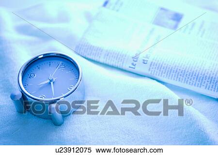 Alarm Clock and Newspaper View Large Photo Image Stock Photography - Alarm Clock and Newspaper. Fotosearch