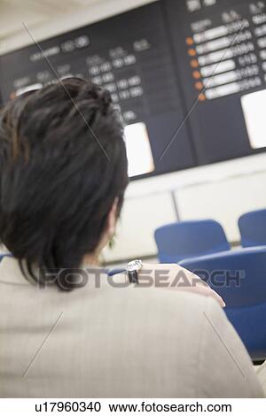 Businessman sitting at airport View Large Photo Image Stock Image - Businessman sitting at airport. Fotosearch