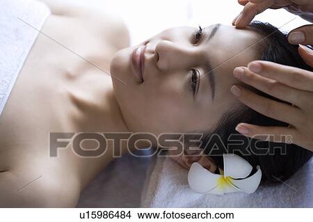 Young woman getting a massage, Saipan View Large Photo Image Picture - Young woman getting a massage, Saipan. Fotosearch