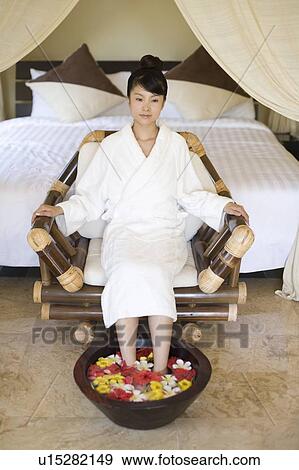 Young woman relaxing in a foot bath, Saipan, Focus on Foreground View Large Photo Image Stock Photo - Young woman relaxing in a foot bath, Saipan, Focus on Foreground. Fotosearch
