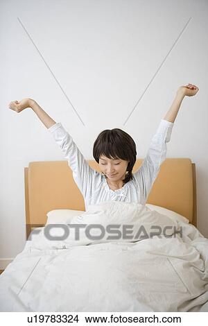 Picture - Housewife waking up. Fotosearch