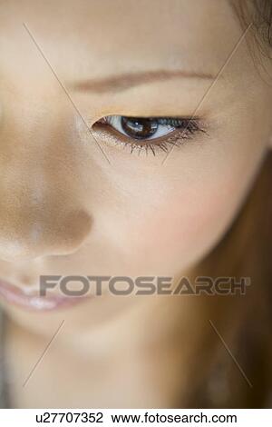Young woman, close-up View Large Photo Image Stock Image - Young woman, close-up. Fotosearch