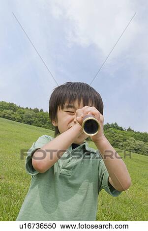 Boy using telescope View Large Photo Image Stock Image - Boy using telescope. Fotosearch