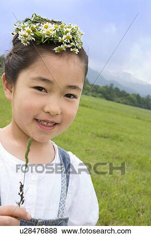 Stock Photo - Girl with flower crown. Fotosearch
