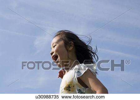Stock Photography - Portrait of smiling girl. Fotosearch
