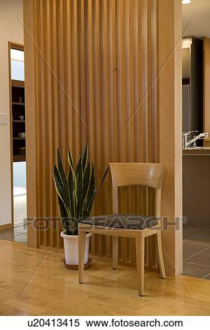 Chair and potted plant View Large Photo Image Stock Photography - Chair and potted plant. Fotosearch