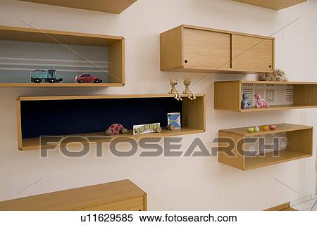 Stock Photography - Shelves on wall. Fotosearch