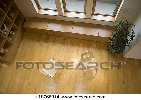 Two chairs on floor View Large Photo Image Picture - Two chairs on floor. Fotosearch