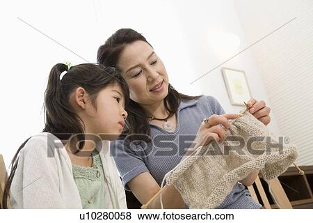 Stock Photo - Grandmother knitting. Fotosearch