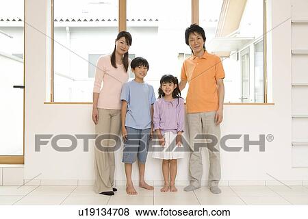 Stock Photo - Portrait of family. Fotosearch