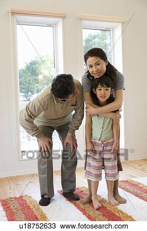 Portrait of grandparents and granddaughter View Large Photo Image Stock Image - Portrait of grandparents and granddaughter. Fotosearch