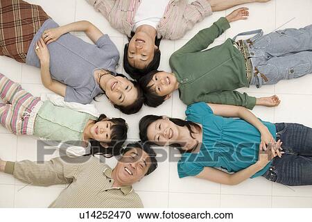 Stock Image - Portrait of three generation family. Fotosearch