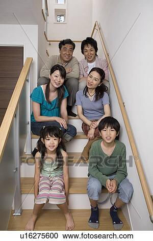 Stock Image - Portrait of three generation family. Fotosearch