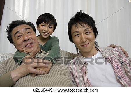 Stock Image - Portrait of three generation family. Fotosearch