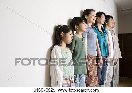 Stock Photography - Portrait of three generation family. Fotosearch