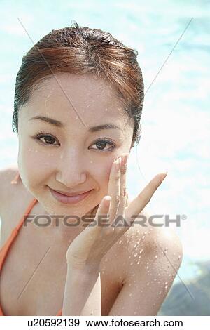 Portrait of young woman in bikini View Large Photo Image Stock Photo - Portrait of young woman in bikini. Fotosearch