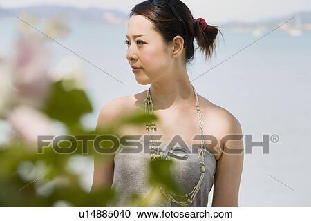 Stock Image - Portrait of young woman. Fotosearch