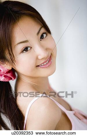 Portrait of young woman View Large Photo Image Stock Image - Portrait of young woman. Fotosearch