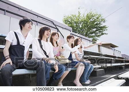College students cheering at stadium View Large Photo Image Stock Image - College students cheering at stadium. Fotosearch