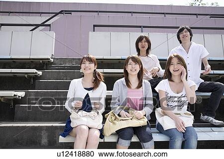 College students cheering at stadium View Large Photo Image Stock Image - College students cheering at stadium. Fotosearch
