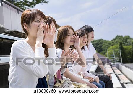 College students cheering at stadium View Large Photo Image Stock Image - College students cheering at stadium. Fotosearch