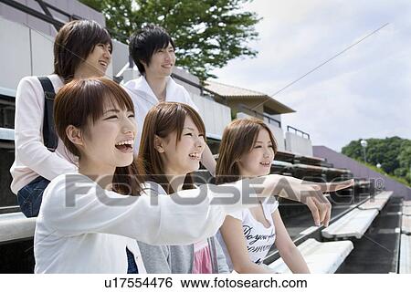 College students cheering at stadium View Large Photo Image Stock Photograph - College students cheering at stadium. Fotosearch