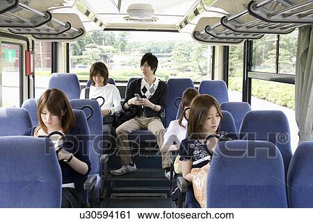 College students sitting in bus View Large Photo Image Stock Image - College students sitting in bus. Fotosearch