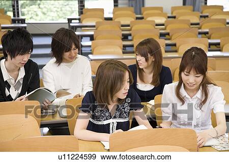 College students studying in lecture room View Large Photo Image Stock Photo - College students studying in lecture room. Fotosearch