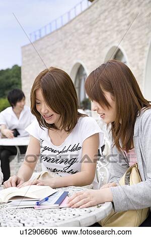 Stock Photograph - College students studying. Fotosearch