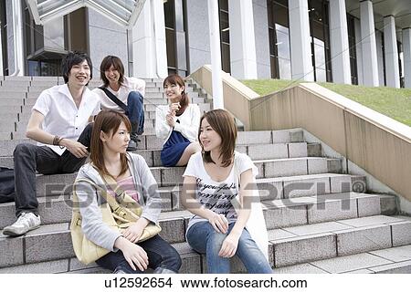 Picture - College students talking. Fotosearch