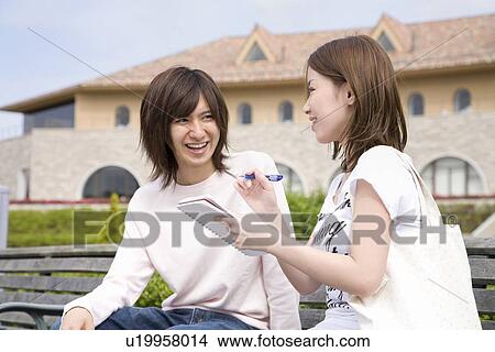 College students talking View Large Photo Image Picture - College students talking. Fotosearch
