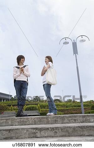College students talking View Large Photo Image Stock Image - College students talking. Fotosearch