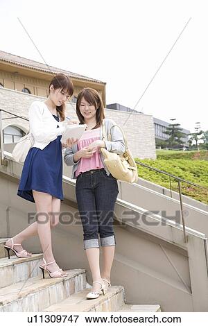 College students talking View Large Photo Image Stock Photo - College students talking. Fotosearch