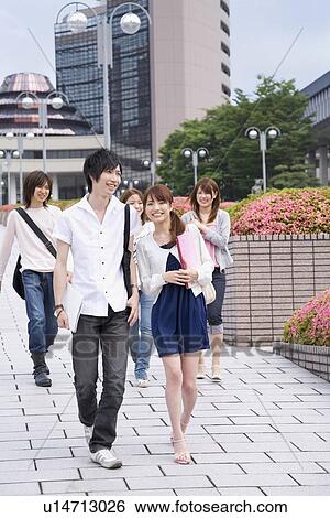Stock Photograph - College students walking. Fotosearch