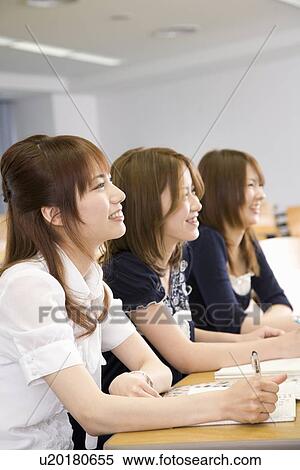 Three young women studying at college View Large Photo Image Stock Photography - Three young women studying at college. Fotosearch