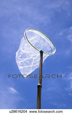 Picture - Close-up of a fishing net in clear sky. Fotosearch