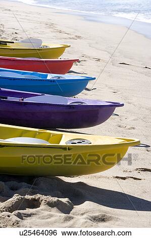 Five multicolored boats at beach, in a row View Large Photo Image Stock Photograph - Five multicolored boats at beach, in a row. Fotosearch